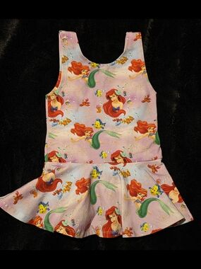 Raising Wilds Ariel Peplum Top